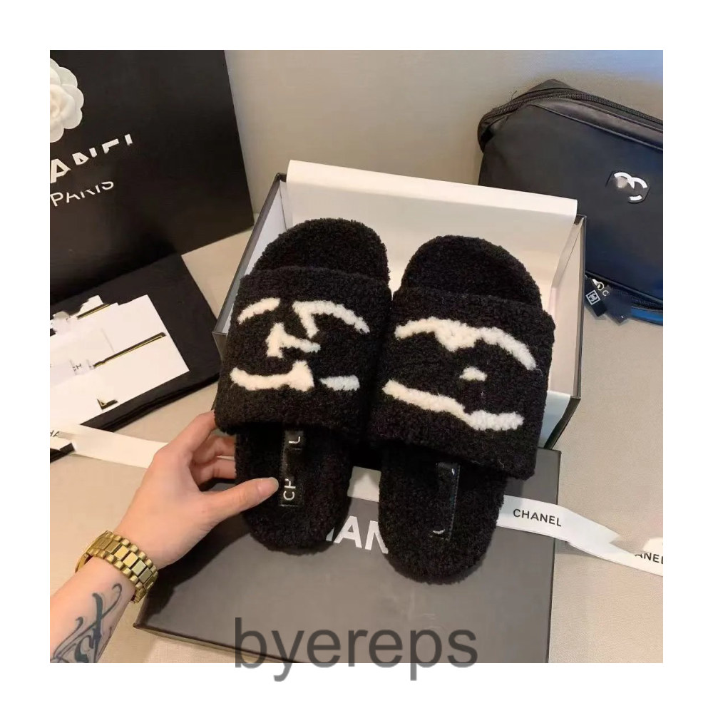 Balenciaga leopard fur slides