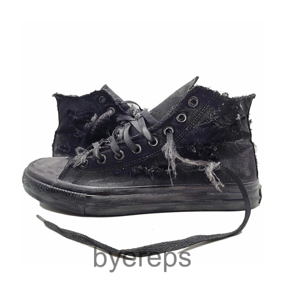 High-top canvas sneakers with holes