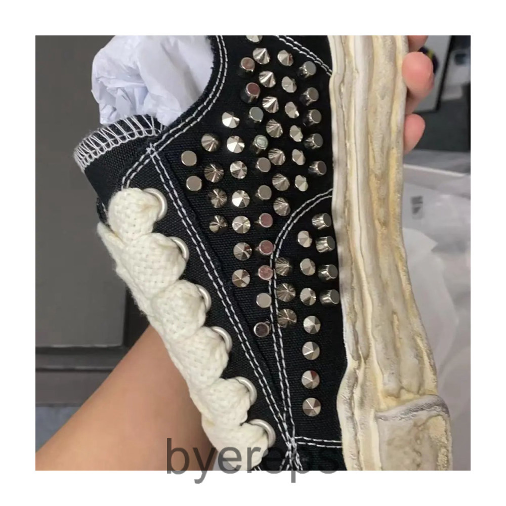 Maison Mihara Yasuhiro Maison Mihara Studded Sneaker — photo 2 of 4
